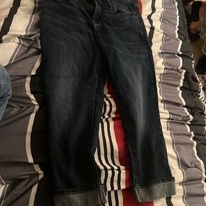 dark navy blue Capri jeans . unsure of size but i believe around 4 to 8 .